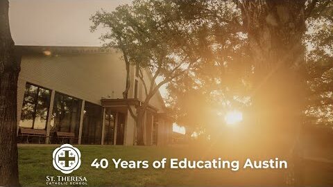 Sunlight through the trees on campus, under the words “40 Years of Educating Austin.”